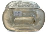 a clear glass container with a label on it