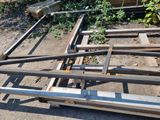 a pile of metal and wood sitting on the ground