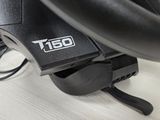 a close up of a steering wheel on a table