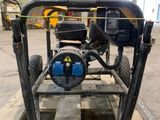 an image of a small engine on a pallet in a warehouse