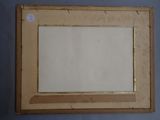 an old picture frame with a picture of a cat on it