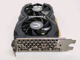 a close up of a video card with a fan on top of it