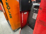 many different types of gas pumps lined up in a row
