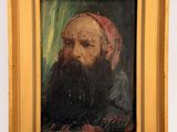 tableau représentant un vieil homme barbu coiffé d'un bonnet rouge