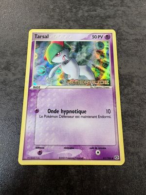 a close up of a pokemon card on a table