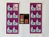 two stamps with a picture of a man and a woman on them