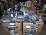 many boxes of electronics on a table in a warehouse