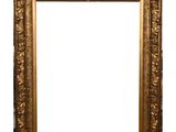 a gold picture frame on a white background
