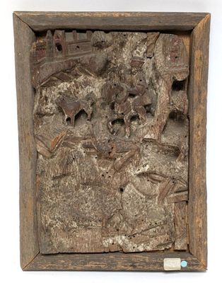 a close up of a piece of wood with a picture of a man on a horse