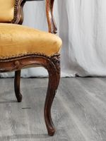 Fauteuil en noyer à dossier cabriolet mouluré sculpté de fle… (photo 4)