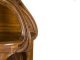 a close up of a wooden shelf with a clock on it