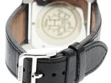 black leather strap on a watch with a silver buckle