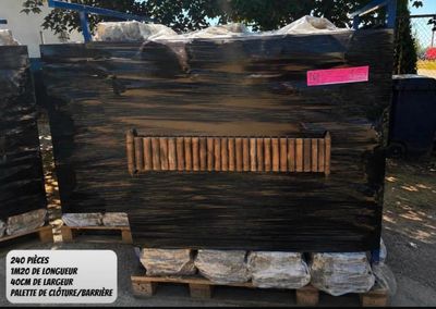 two boxes that are sitting on a pallet in the yard