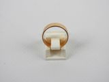 an image of a gold ring with a white marble block in the middle