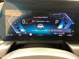 the dashboard of a car with a digital display on it