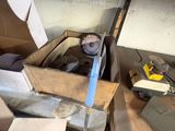 a cardboard box with a stuffed animal inside of it