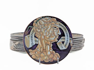 a picture of a ring with a picture of a woman on it