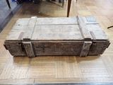 an old trunk sitting on the floor in a room