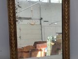a mirror that is sitting on a table