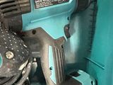 a cordless drill and a cordless hammer in a box