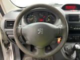 dashboard of a car with a steering wheel and dashboard controls