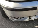 a close up view of a car ' s front bumper