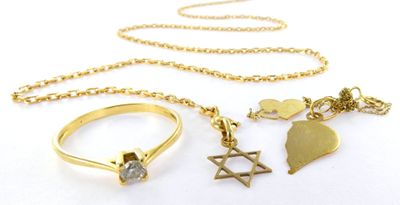 a gold necklace with a star of david and a star of david on it