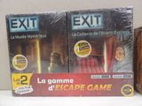 two exit games sitting on a table next to each other