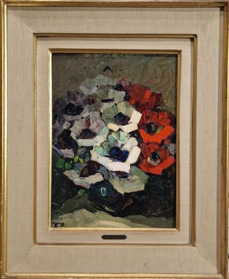 tableau représentant un vase de fleurs dans un cadre doré posé sur une table