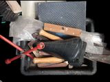 many tools in a box that are sitting on a table