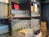 many glasses on the counter in the store