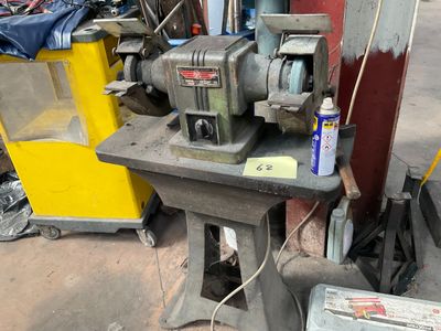 a machine that is sitting on a table in a garage
