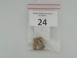 a plastic bag with a small metal object in it