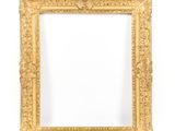 an ornate gold frame with a white background and a white background