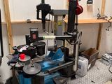 a blue machine that is sitting in a room