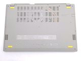 a laptop that is sitting on a white surface