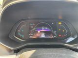 the dashboard of a car with a digital display on it