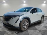 2020 nissan leaf electric vehicle parked in a showroom with a checkered floor