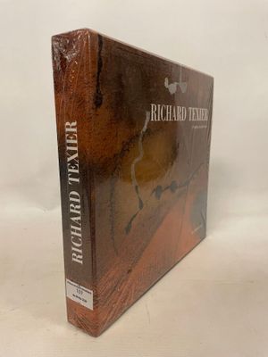 the book is sitting on a white surface with a white background