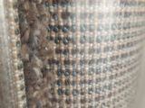 a close up of a piece of fabric with a hole in it