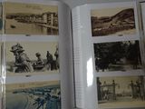 a book opened to show pictures of a city