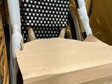 a cardboard box sitting on top of a chair