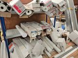 many rolls of toilet paper on the shelves in the store