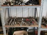 a lot of tools on the shelves in the garage