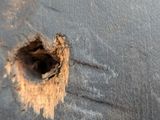 a piece of wood with a hole in it