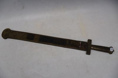 a small knife that is laying on a table