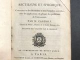 an open book on a table with a black background