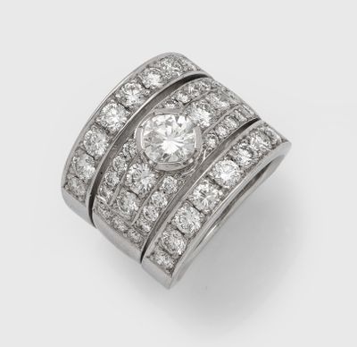 a diamond and platinum - plated ring, by van cleef