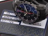 a watch that is sitting on top of a black case