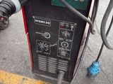 a machine that is sitting on the ground with wires